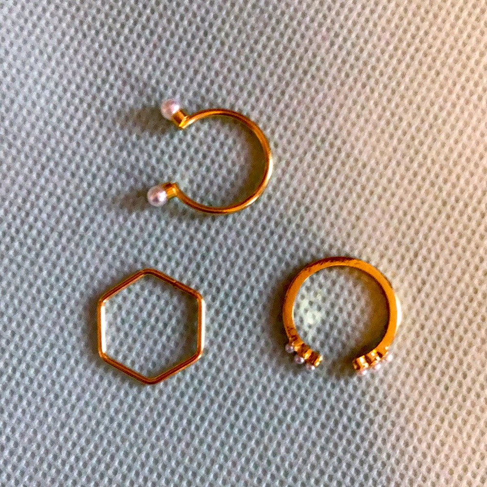 These three rings are brand new gold and very shiny.